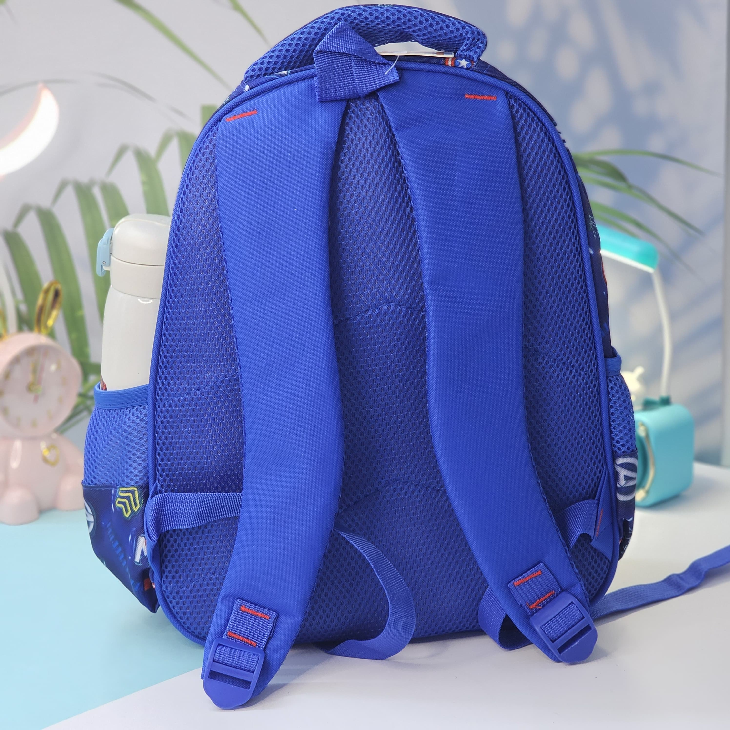 "Stylish and practical Usmile Toys backpack for boys, adorned with popular cartoon superhero characters, including Iron Man and Thor." www.usmile.toys